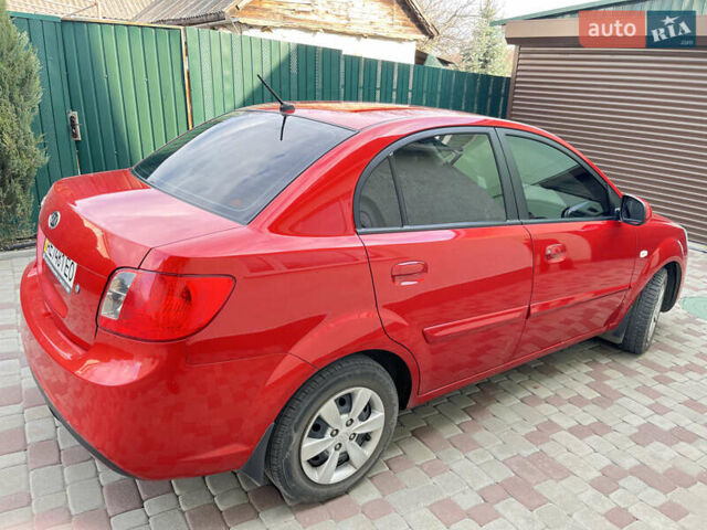 Червоний Кіа Ріо, об'ємом двигуна 1.4 л та пробігом 46 тис. км за 6200 $, фото 1 на Automoto.ua