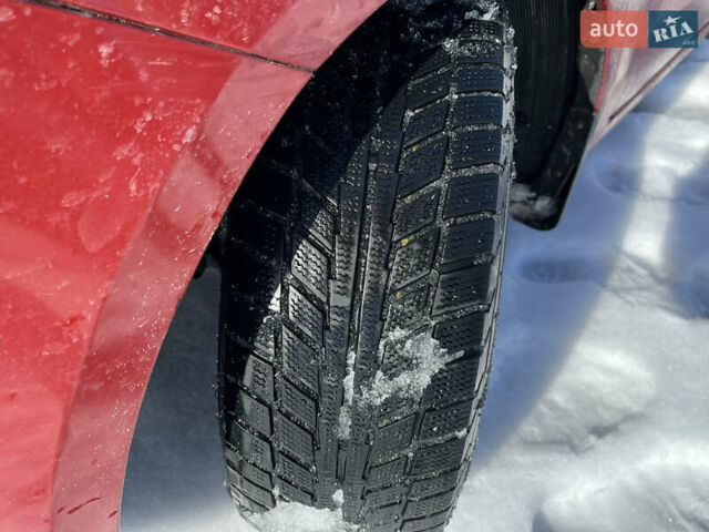 Червоний Кіа Ріо, об'ємом двигуна 1.4 л та пробігом 170 тис. км за 4500 $, фото 19 на Automoto.ua