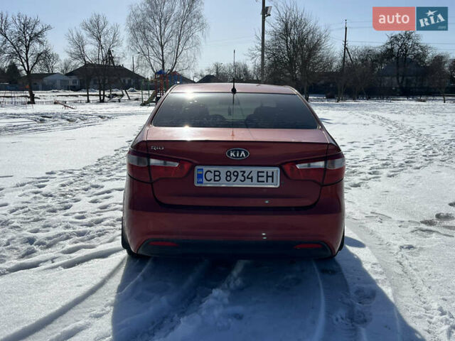 Червоний Кіа Ріо, об'ємом двигуна 1.4 л та пробігом 170 тис. км за 4500 $, фото 4 на Automoto.ua