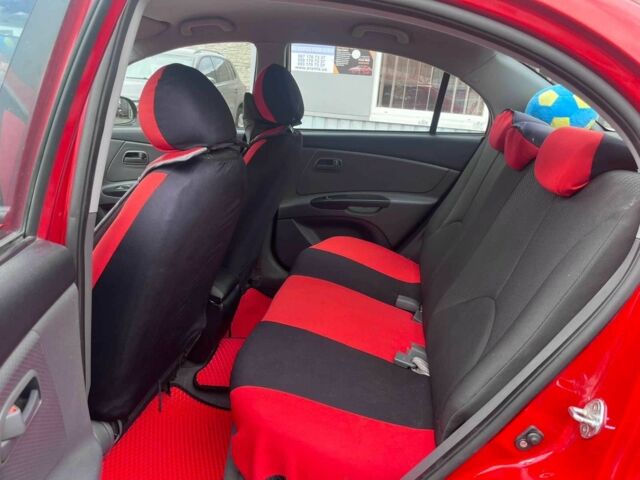 Червоний Кіа Ріо, об'ємом двигуна 1.4 л та пробігом 113 тис. км за 5899 $, фото 10 на Automoto.ua