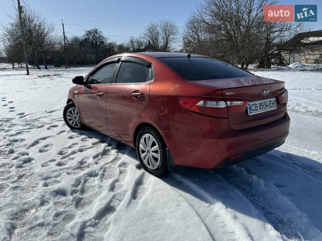 Червоний Кіа Ріо, об'ємом двигуна 1.4 л та пробігом 170 тис. км за 4500 $, фото 3 на Automoto.ua