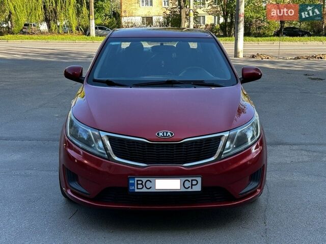 Красный Киа Рио, объемом двигателя 1.4 л и пробегом 190 тыс. км за 5999 $, фото 1 на Automoto.ua