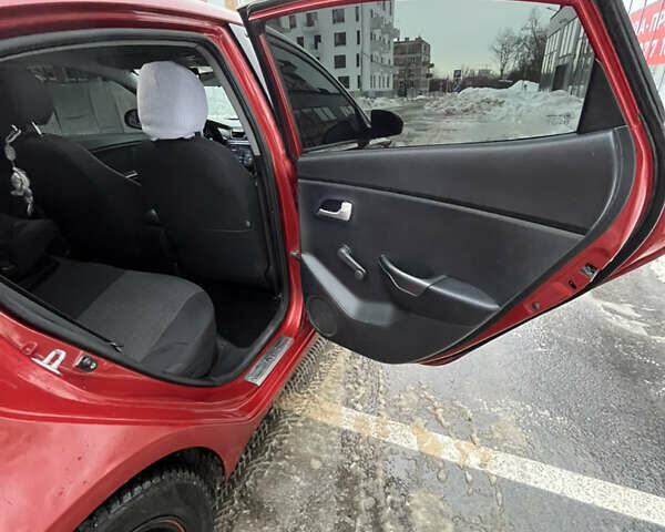 Красный Киа Рио, объемом двигателя 1.4 л и пробегом 212 тыс. км за 6000 $, фото 15 на Automoto.ua