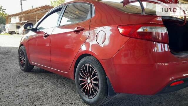 Красный Киа Рио, объемом двигателя 1.4 л и пробегом 319 тыс. км за 5700 $, фото 20 на Automoto.ua