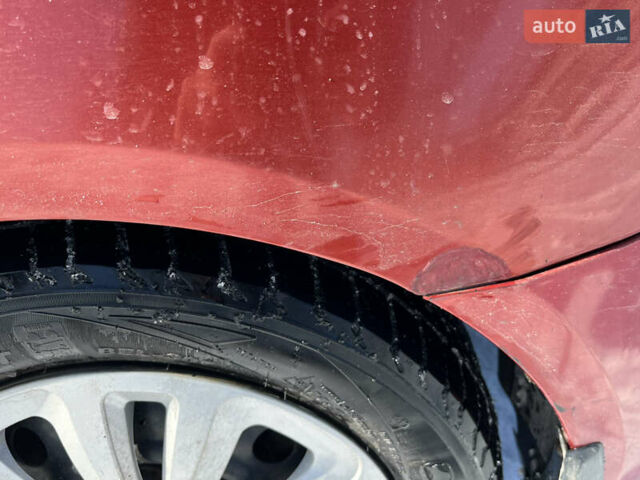 Червоний Кіа Ріо, об'ємом двигуна 1.4 л та пробігом 170 тис. км за 4500 $, фото 17 на Automoto.ua