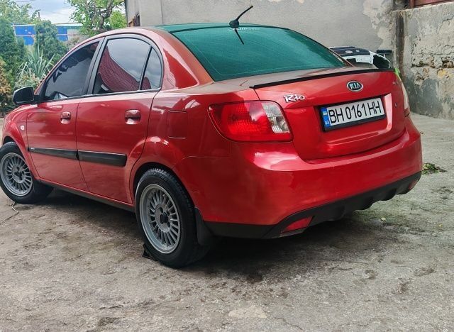 Червоний Кіа Ріо, об'ємом двигуна 1.4 л та пробігом 208 тис. км за 3950 $, фото 18 на Automoto.ua