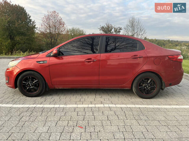 Красный Киа Рио, объемом двигателя 1.4 л и пробегом 202 тыс. км за 7300 $, фото 5 на Automoto.ua