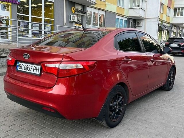 Червоний Кіа Ріо, об'ємом двигуна 1.4 л та пробігом 220 тис. км за 5000 $, фото 7 на Automoto.ua