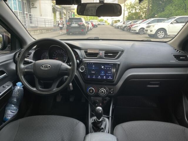 Червоний Кіа Ріо, об'ємом двигуна 1.4 л та пробігом 220 тис. км за 5700 $, фото 7 на Automoto.ua