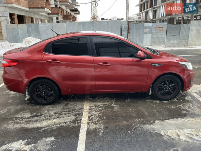 Красный Киа Рио, объемом двигателя 1.4 л и пробегом 212 тыс. км за 6000 $, фото 6 на Automoto.ua