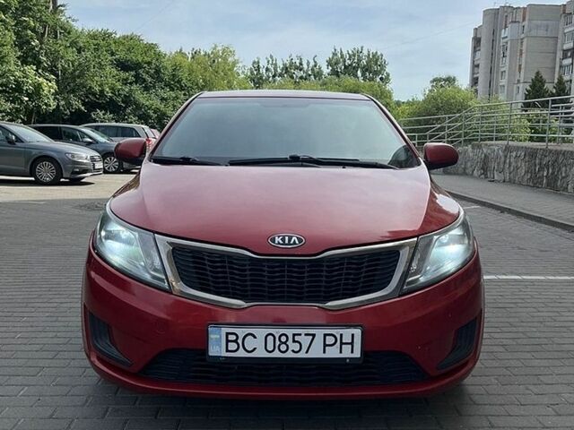 Червоний Кіа Ріо, об'ємом двигуна 1.4 л та пробігом 220 тис. км за 5000 $, фото 1 на Automoto.ua
