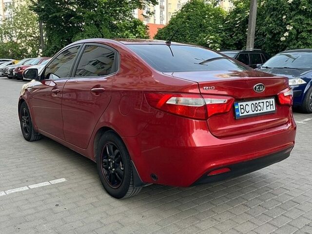 Червоний Кіа Ріо, об'ємом двигуна 1.4 л та пробігом 220 тис. км за 5000 $, фото 4 на Automoto.ua