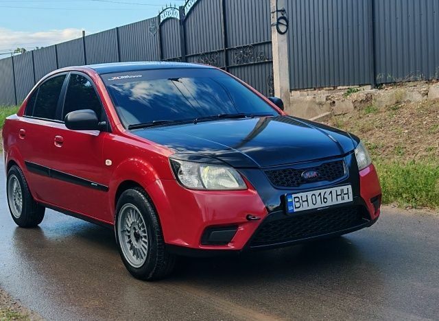 Червоний Кіа Ріо, об'ємом двигуна 1.4 л та пробігом 208 тис. км за 3950 $, фото 19 на Automoto.ua