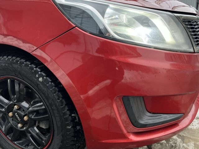 Червоний Кіа Ріо, об'ємом двигуна 1.4 л та пробігом 212 тис. км за 6000 $, фото 18 на Automoto.ua