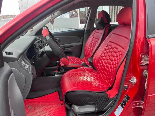 Червоний Кіа Ріо, об'ємом двигуна 1.4 л та пробігом 113 тис. км за 5899 $, фото 8 на Automoto.ua