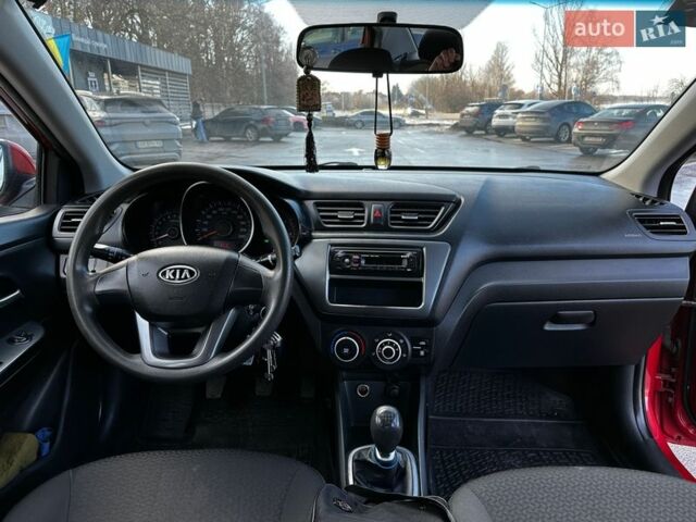 Червоний Кіа Ріо, об'ємом двигуна 1.4 л та пробігом 190 тис. км за 6350 $, фото 13 на Automoto.ua