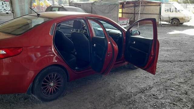 Красный Киа Рио, объемом двигателя 1.4 л и пробегом 319 тыс. км за 6000 $, фото 26 на Automoto.ua