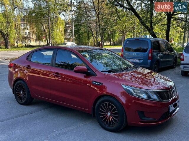 Червоний Кіа Ріо, об'ємом двигуна 1.4 л та пробігом 190 тис. км за 5999 $, фото 4 на Automoto.ua