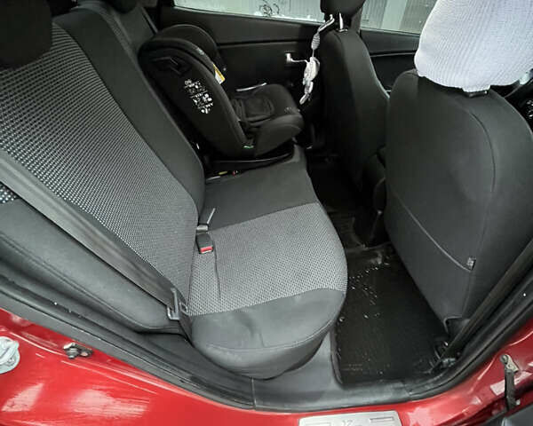 Красный Киа Рио, объемом двигателя 1.4 л и пробегом 212 тыс. км за 6000 $, фото 14 на Automoto.ua