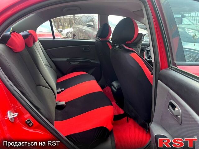 Красный Киа Рио, объемом двигателя 1.4 л и пробегом 113 тыс. км за 5899 $, фото 11 на Automoto.ua