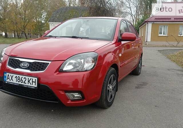 Красный Киа Рио, объемом двигателя 1.4 л и пробегом 94 тыс. км за 6200 $, фото 4 на Automoto.ua