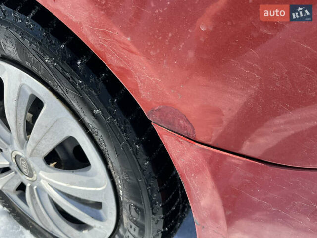 Червоний Кіа Ріо, об'ємом двигуна 1.4 л та пробігом 170 тис. км за 4500 $, фото 10 на Automoto.ua