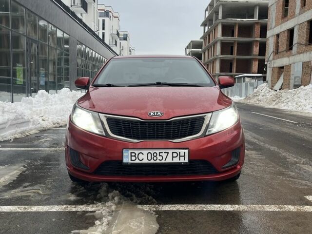 Червоний Кіа Ріо, об'ємом двигуна 1.4 л та пробігом 212 тис. км за 6000 $, фото 1 на Automoto.ua