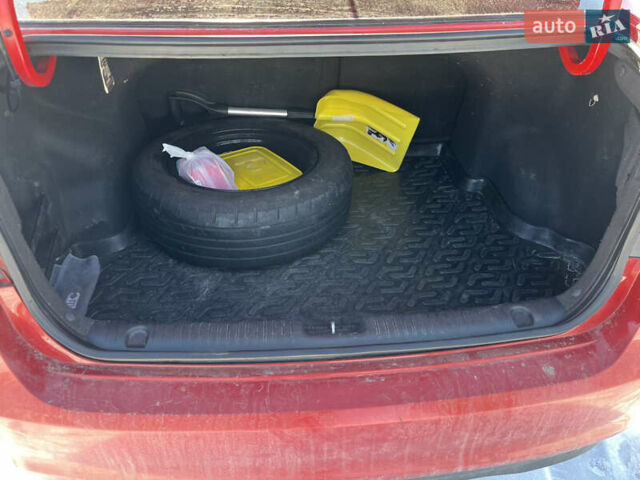 Червоний Кіа Ріо, об'ємом двигуна 1.4 л та пробігом 170 тис. км за 4500 $, фото 26 на Automoto.ua