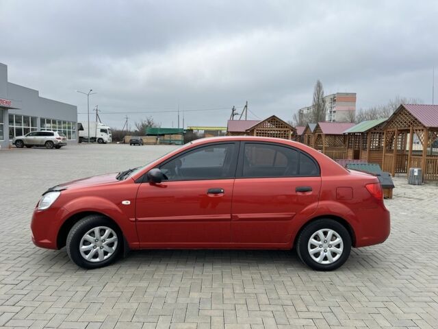 Червоний Кіа Ріо, об'ємом двигуна 1.4 л та пробігом 250 тис. км за 3800 $, фото 5 на Automoto.ua