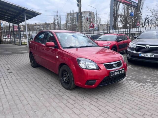 Червоний Кіа Ріо, об'ємом двигуна 1.4 л та пробігом 113 тис. км за 5899 $, фото 2 на Automoto.ua