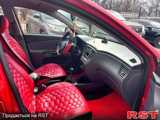 Красный Киа Рио, объемом двигателя 1.4 л и пробегом 113 тыс. км за 5899 $, фото 12 на Automoto.ua