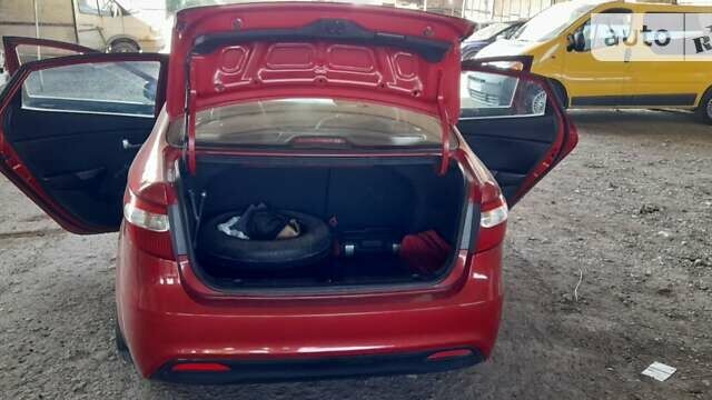 Красный Киа Рио, объемом двигателя 1.4 л и пробегом 319 тыс. км за 6000 $, фото 24 на Automoto.ua