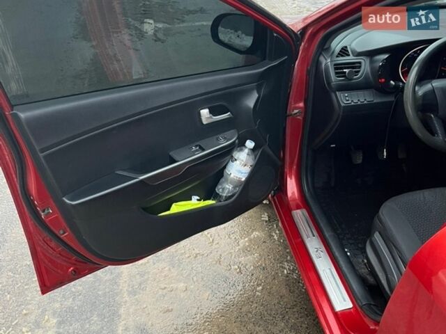 Красный Киа Рио, объемом двигателя 1.4 л и пробегом 214 тыс. км за 5900 $, фото 14 на Automoto.ua