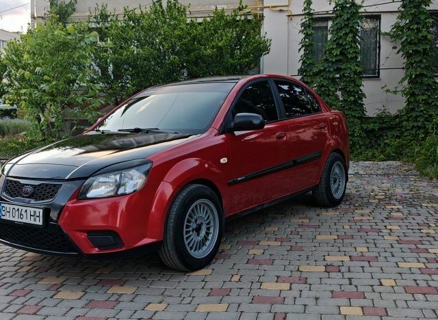 Червоний Кіа Ріо, об'ємом двигуна 1.4 л та пробігом 208 тис. км за 3950 $, фото 3 на Automoto.ua