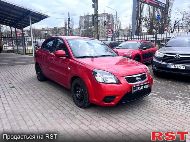 Красный Киа Рио, объемом двигателя 1.4 л и пробегом 113 тыс. км за 5899 $, фото 2 на Automoto.ua