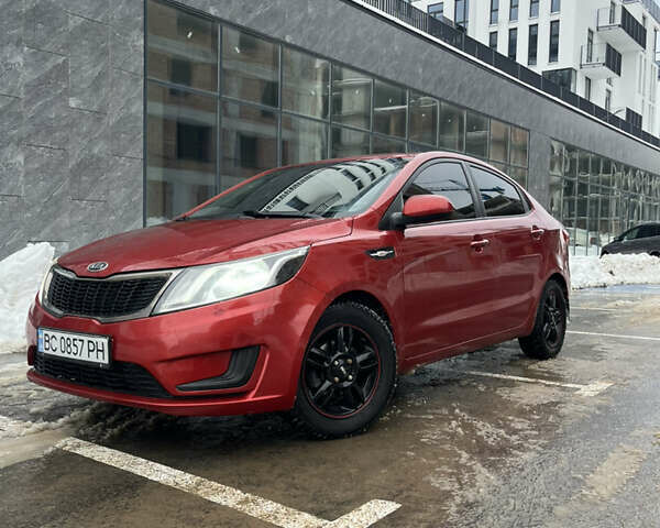 Красный Киа Рио, объемом двигателя 1.4 л и пробегом 212 тыс. км за 6000 $, фото 1 на Automoto.ua