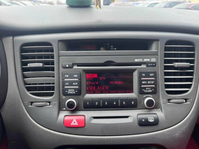 Червоний Кіа Ріо, об'ємом двигуна 1.4 л та пробігом 113 тис. км за 5899 $, фото 14 на Automoto.ua