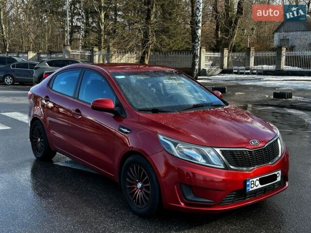 Червоний Кіа Ріо, об'ємом двигуна 1.4 л та пробігом 190 тис. км за 6350 $, фото 1 на Automoto.ua
