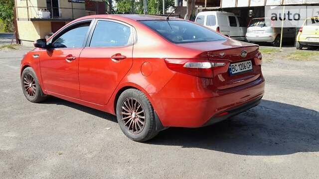 Красный Киа Рио, объемом двигателя 1.4 л и пробегом 319 тыс. км за 5700 $, фото 14 на Automoto.ua