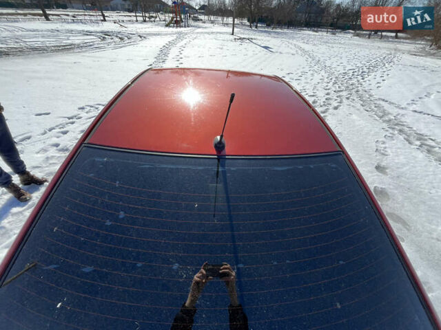 Червоний Кіа Ріо, об'ємом двигуна 1.4 л та пробігом 170 тис. км за 4500 $, фото 7 на Automoto.ua