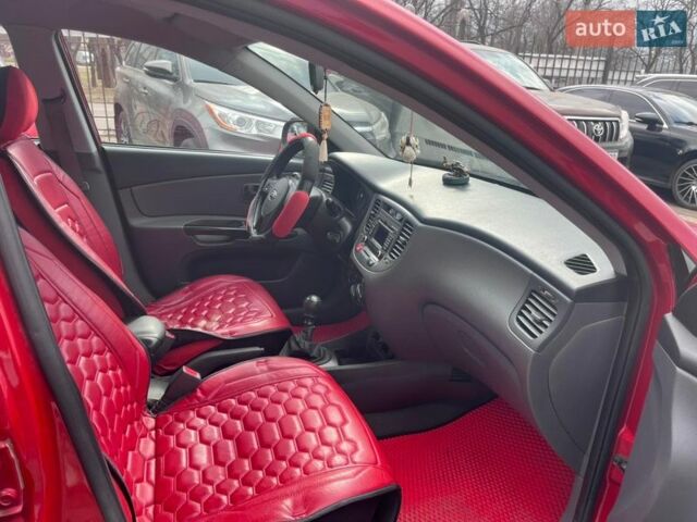 Красный Киа Рио, объемом двигателя 1.4 л и пробегом 113 тыс. км за 5100 $, фото 16 на Automoto.ua