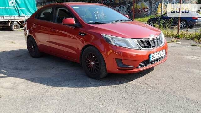 Красный Киа Рио, объемом двигателя 1.4 л и пробегом 319 тыс. км за 5700 $, фото 16 на Automoto.ua