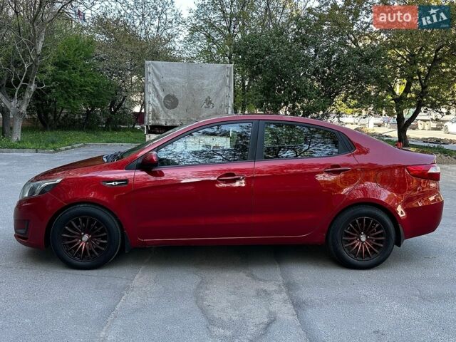 Красный Киа Рио, объемом двигателя 1.4 л и пробегом 190 тыс. км за 5999 $, фото 8 на Automoto.ua