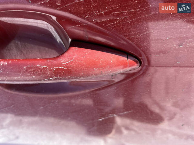 Червоний Кіа Ріо, об'ємом двигуна 1.4 л та пробігом 170 тис. км за 4500 $, фото 16 на Automoto.ua