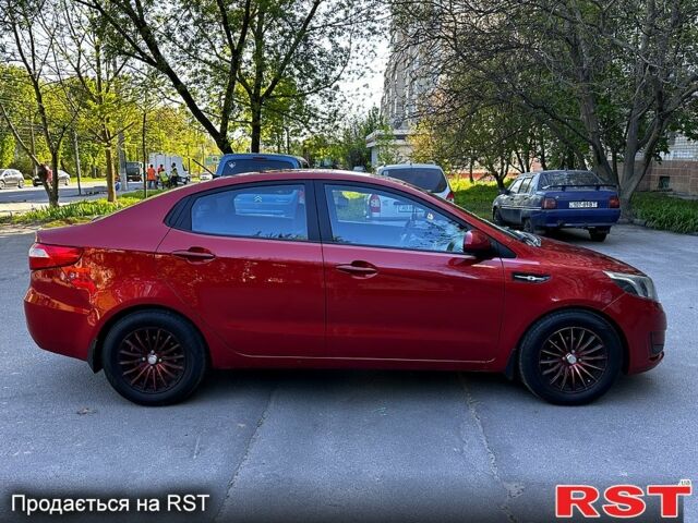 Красный Киа Рио, объемом двигателя 1.4 л и пробегом 190 тыс. км за 6350 $, фото 2 на Automoto.ua