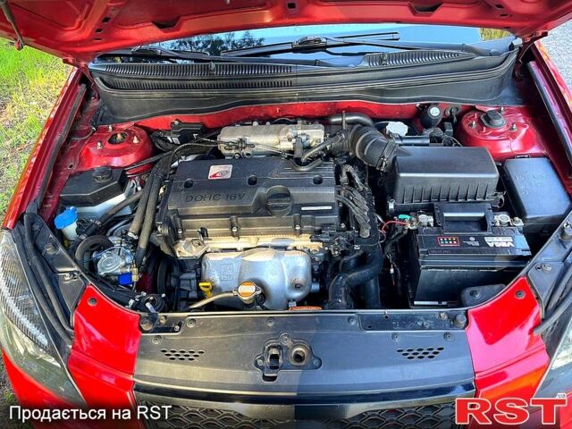 Красный Киа Рио, объемом двигателя 1.4 л и пробегом 155 тыс. км за 6700 $, фото 9 на Automoto.ua