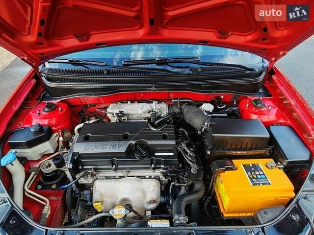 Красный Киа Рио, объемом двигателя 1.4 л и пробегом 300 тыс. км за 4200 $, фото 12 на Automoto.ua