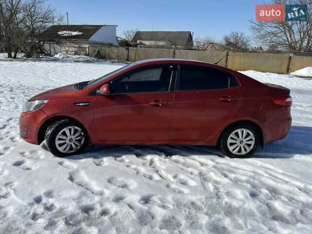 Червоний Кіа Ріо, об'ємом двигуна 1.4 л та пробігом 170 тис. км за 4500 $, фото 2 на Automoto.ua