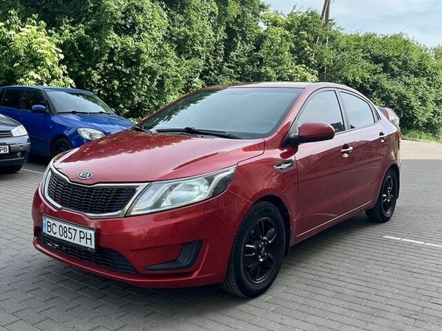Червоний Кіа Ріо, об'ємом двигуна 1.4 л та пробігом 220 тис. км за 5000 $, фото 2 на Automoto.ua