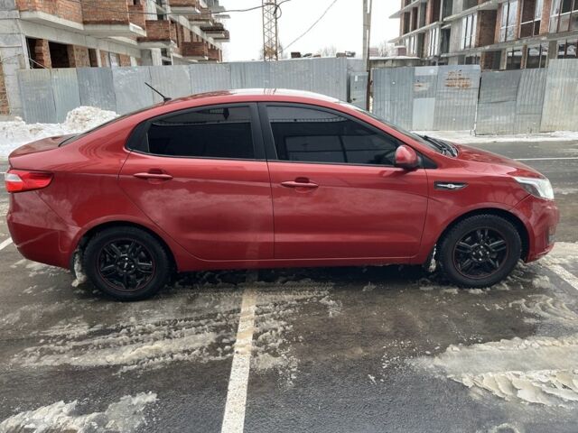 Червоний Кіа Ріо, об'ємом двигуна 1.4 л та пробігом 212 тис. км за 6000 $, фото 3 на Automoto.ua